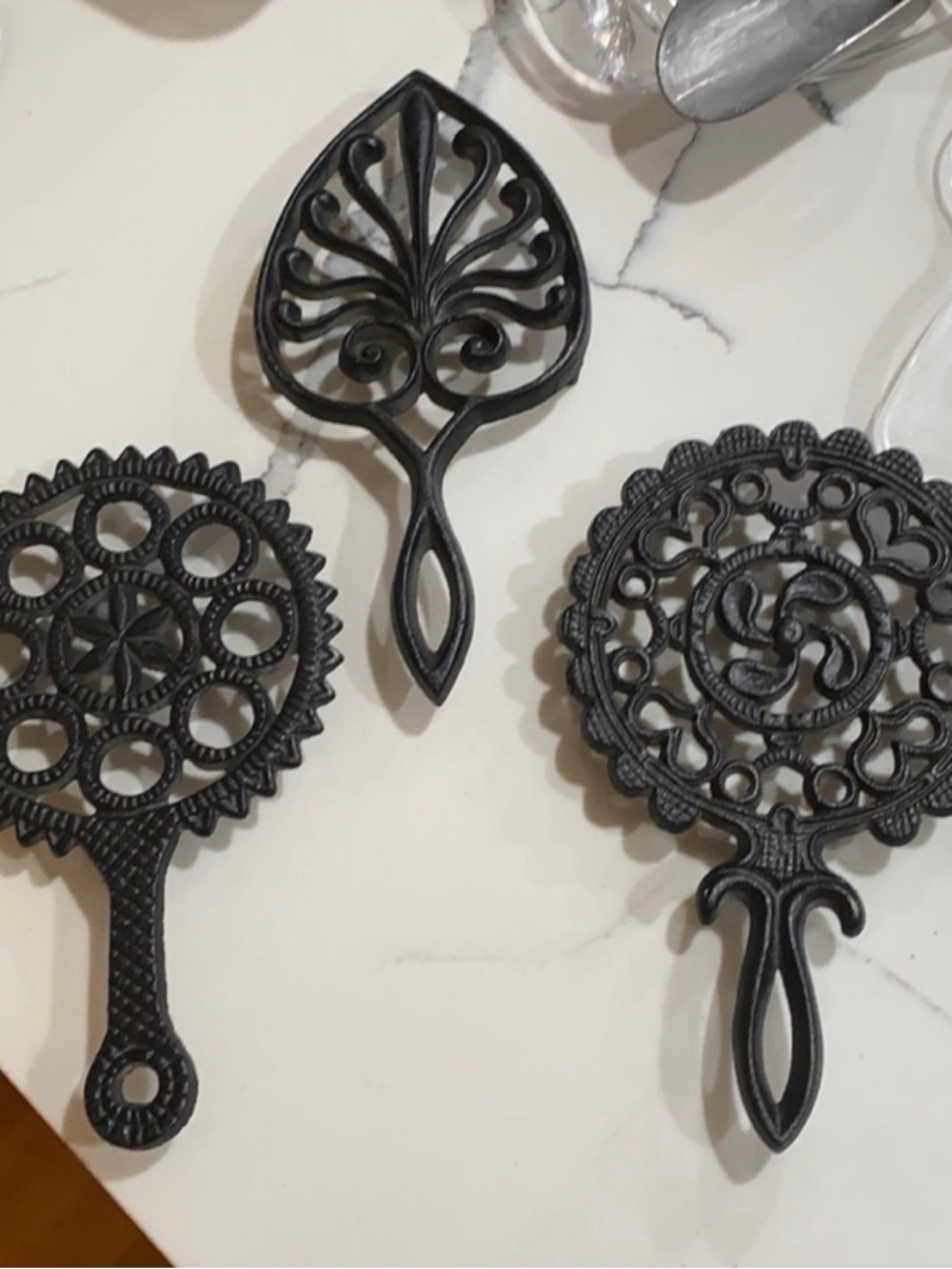 Set of three- Wilton Cast Iron Trivets and Wall Decor
